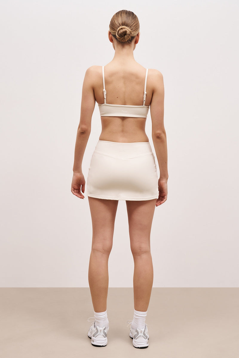 Base Sculpting Tennis Skort - Tofu